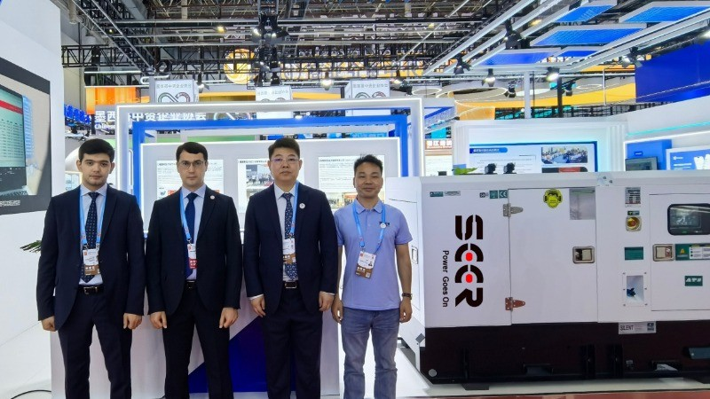SEER POWER team beside a generator set at CIFIT Xiamen 2025.